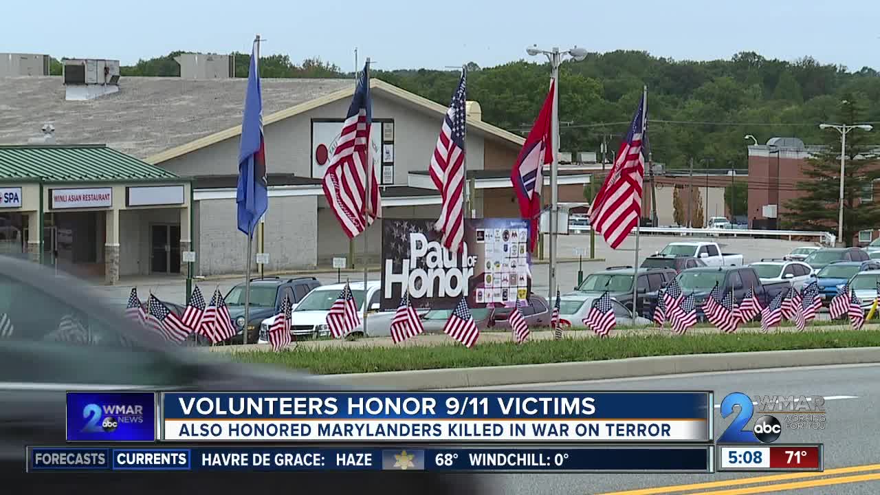 Thousands of flags placed along road to honor 9/11 first responders