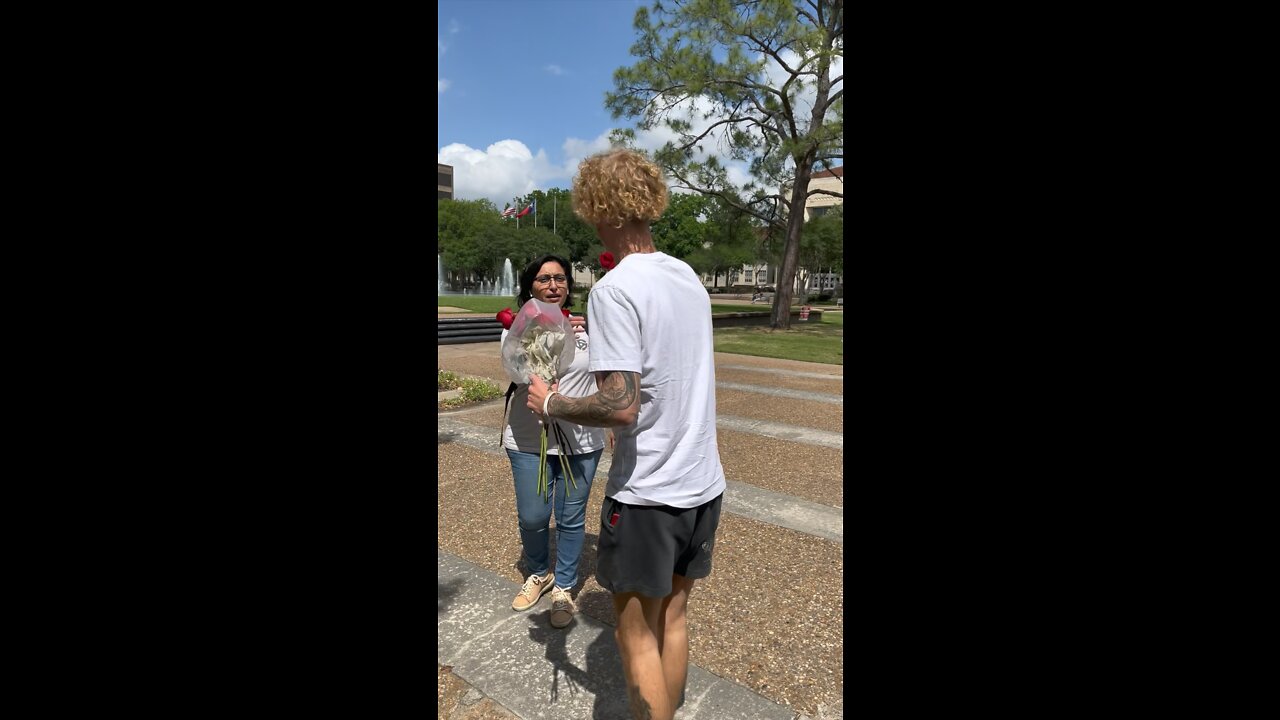 Giving roses out to strangers!