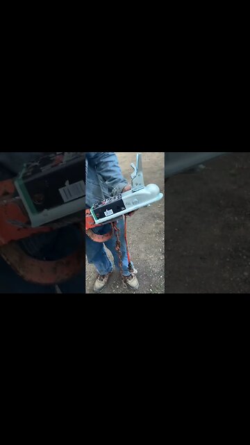 tim hammering the hitch on