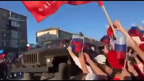 Dagestan patriots line the streets to welcome Z back from the front line.