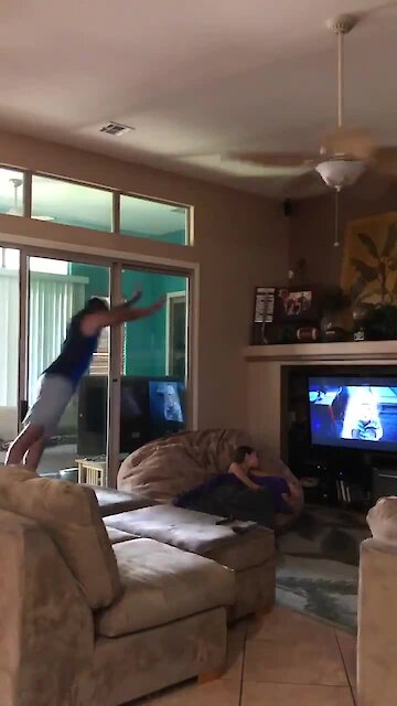 Dude jumps onto beanbag, sends sister flying into the air