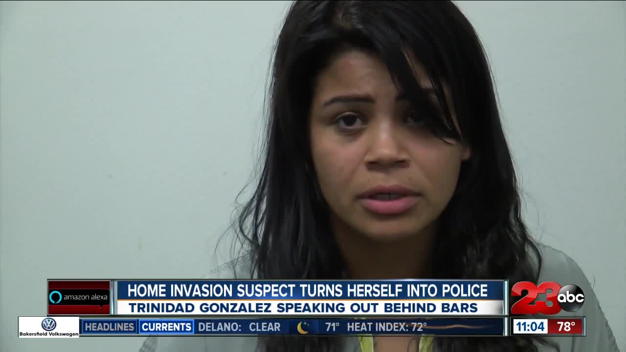 Home invasion suspect turns herself into police and speaks out