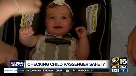 Making sure your child is buckled in a safety seat properly