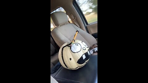 Lillianna presents her pumpkin