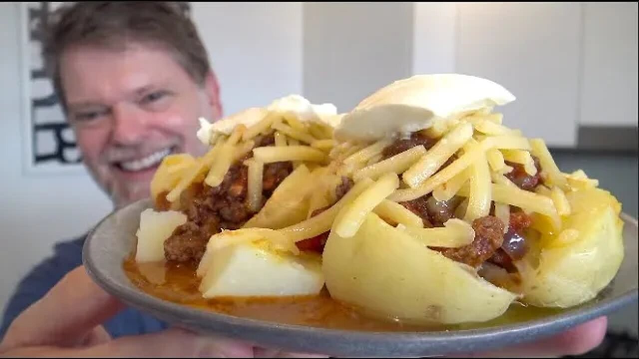 Microwave Potato With Bolognese and Lots Of Cheese