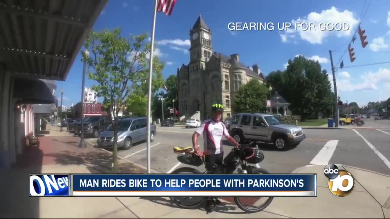 Man rides bike to help people with Parkinson's