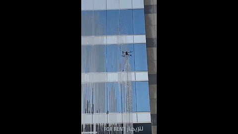 how high building glass wash by drone