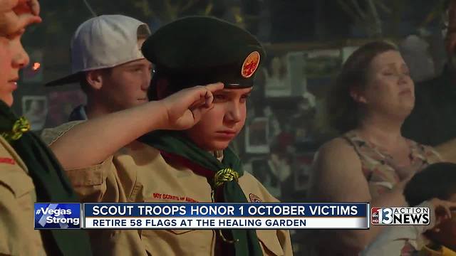 Scout troops retire 58 flags for 1 October victims