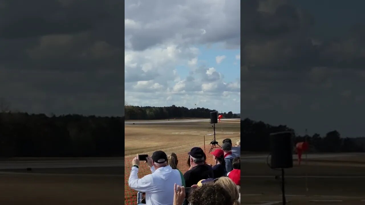 Biplane Cuts Ribbon!