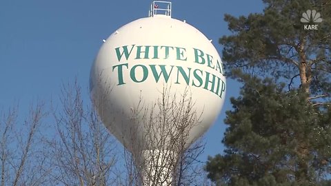 Leaking water tower coats Minnesota streets in ice