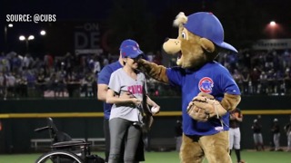 1 October shooting survivor throws first pitch at Chicago Cubs game