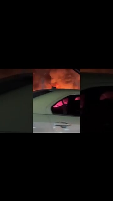 Los Angeles: Bonfire at the encampment on the median La Cienega / San Vicente.