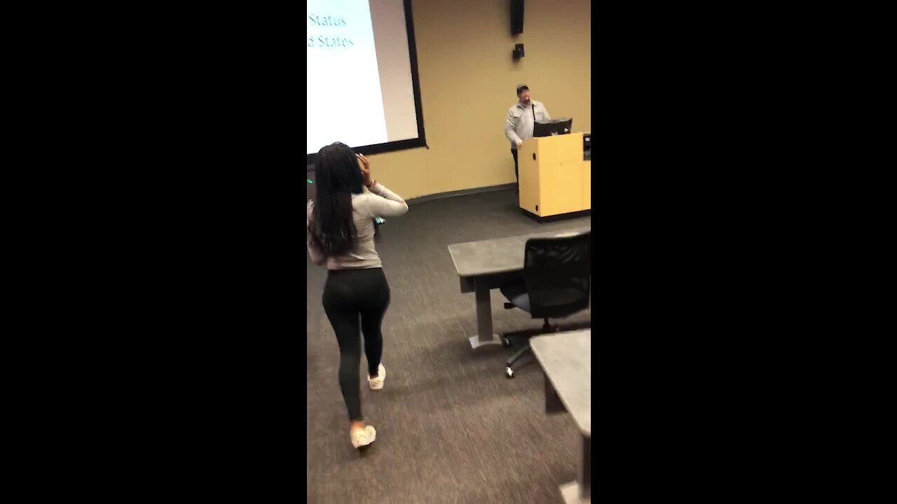 Students surprise professor with cake & card