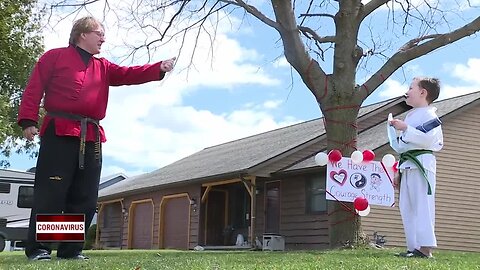 Courage Martial Arts throws driveway graduation