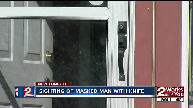 Tulsa woman claims masked man wielding knife appeared at back door during the night