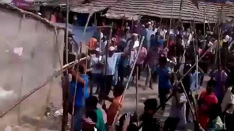 Insanity: Two separate villages go to war with sticks against each other.