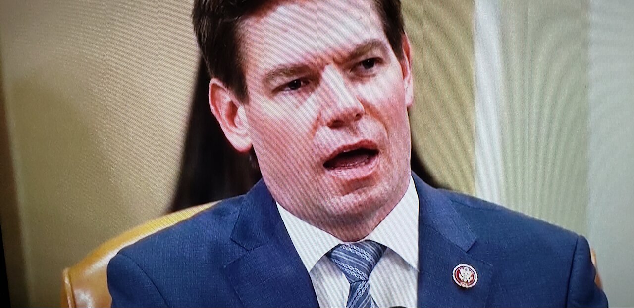 Eric Swalwell wearing Great Seal of the United States [RED]