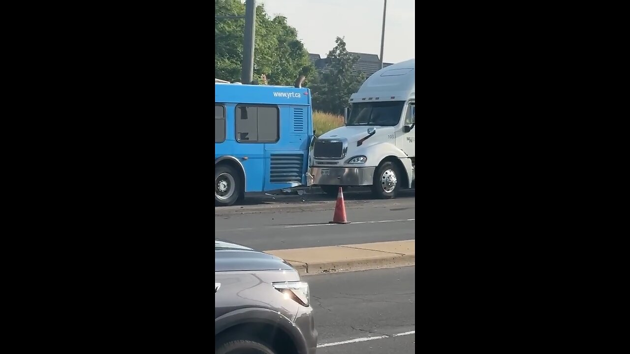 Truck Crashes Into Bus