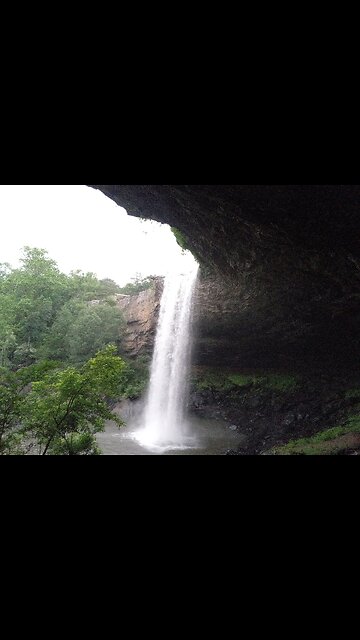 Behind the waterfall
