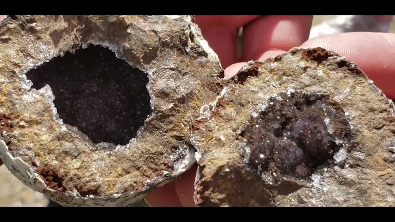 Tiny red smoky geode