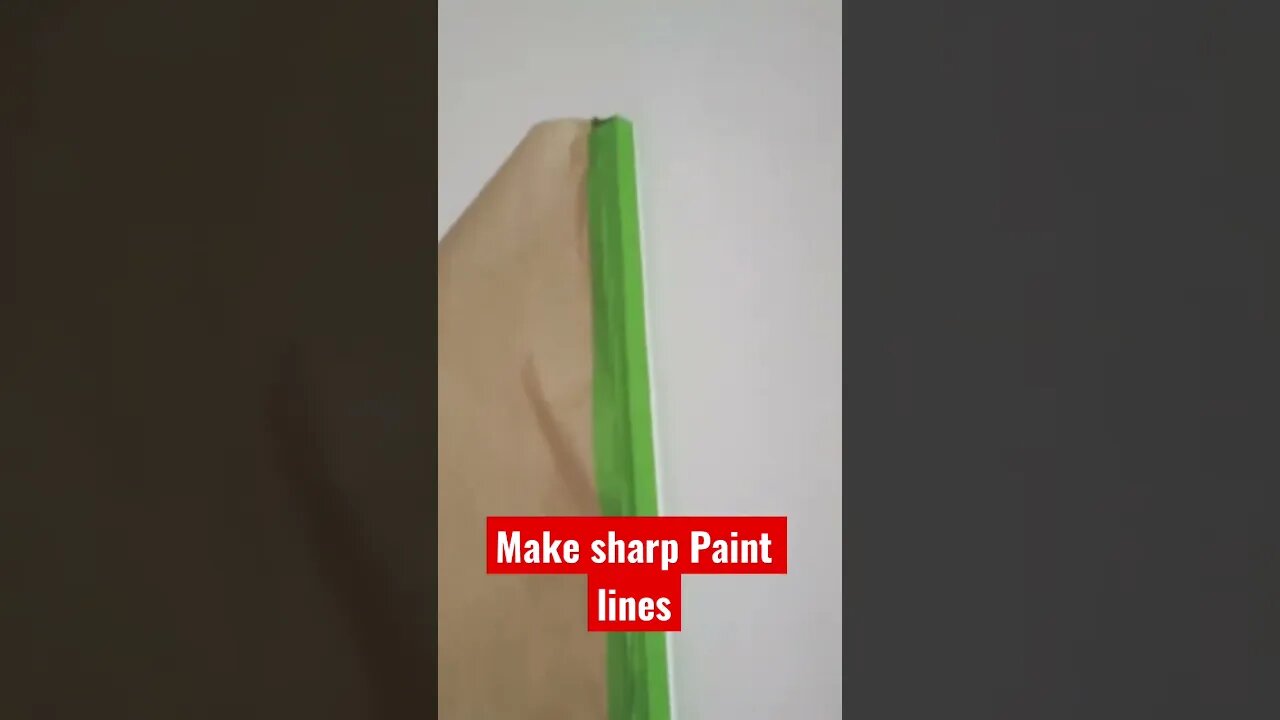 Make sharp paint lines using tape and caulk