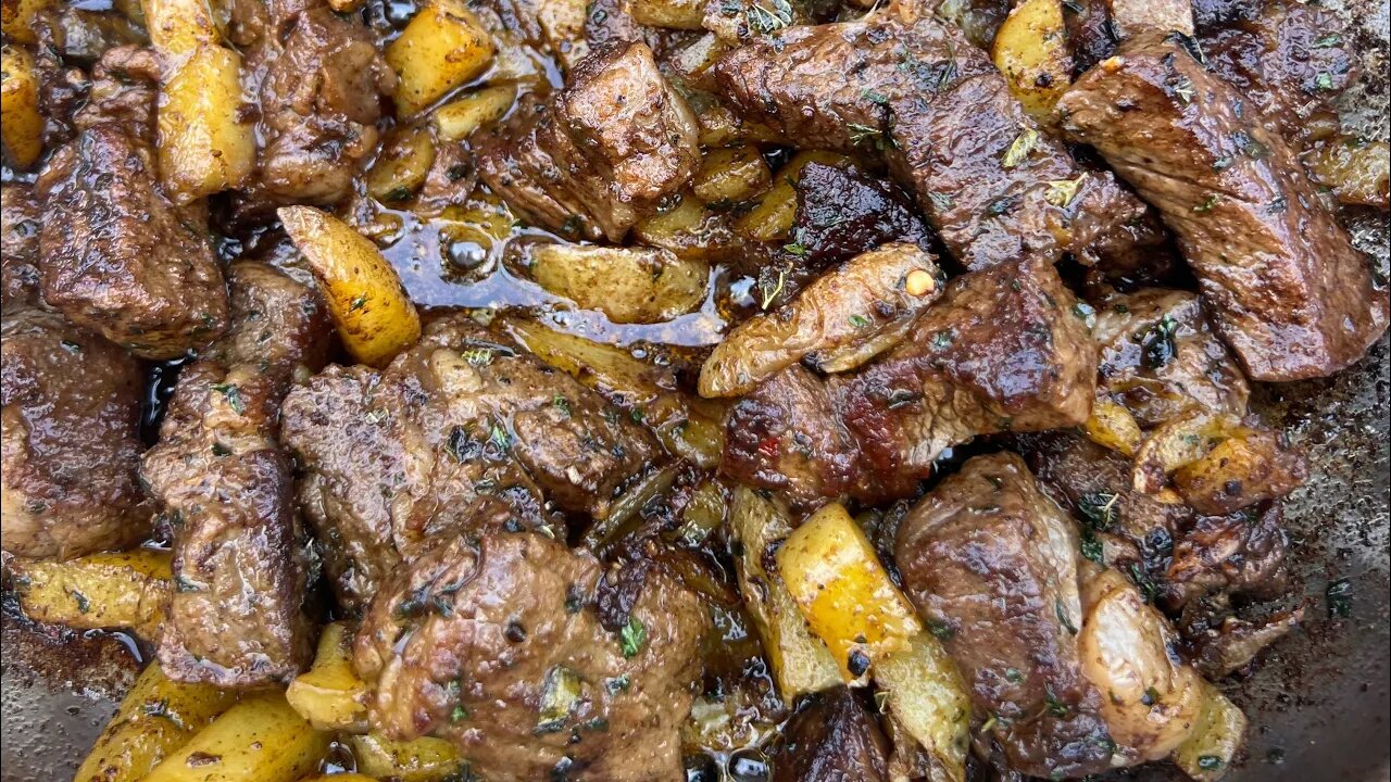 Buttery garlic steak bites and potatoes