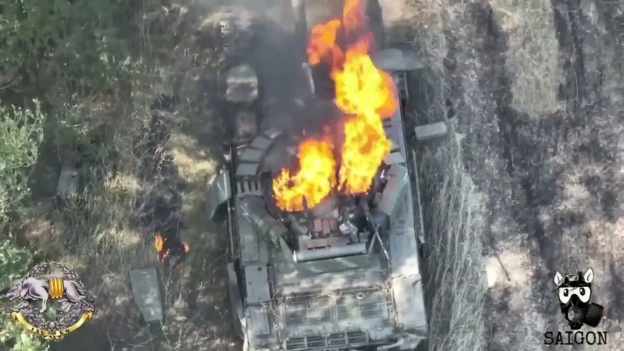 A precise drop of grenade on Russian T-72B3M tank by Ukrainian drone