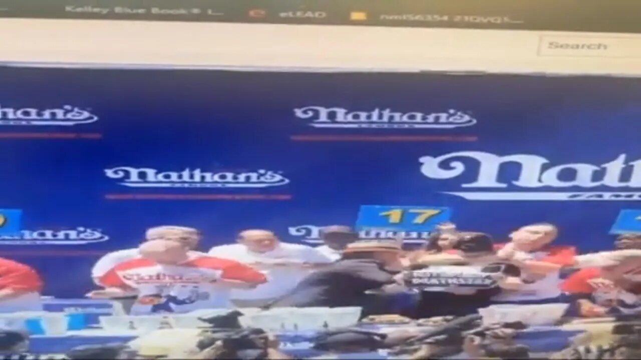 Snaps the dude’s neck and keeps on shoving hot dogs in his face