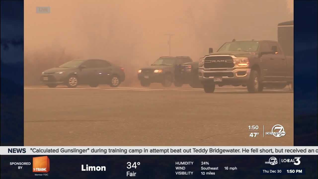 Smoke from nearby wildfires fills the air in Louisville