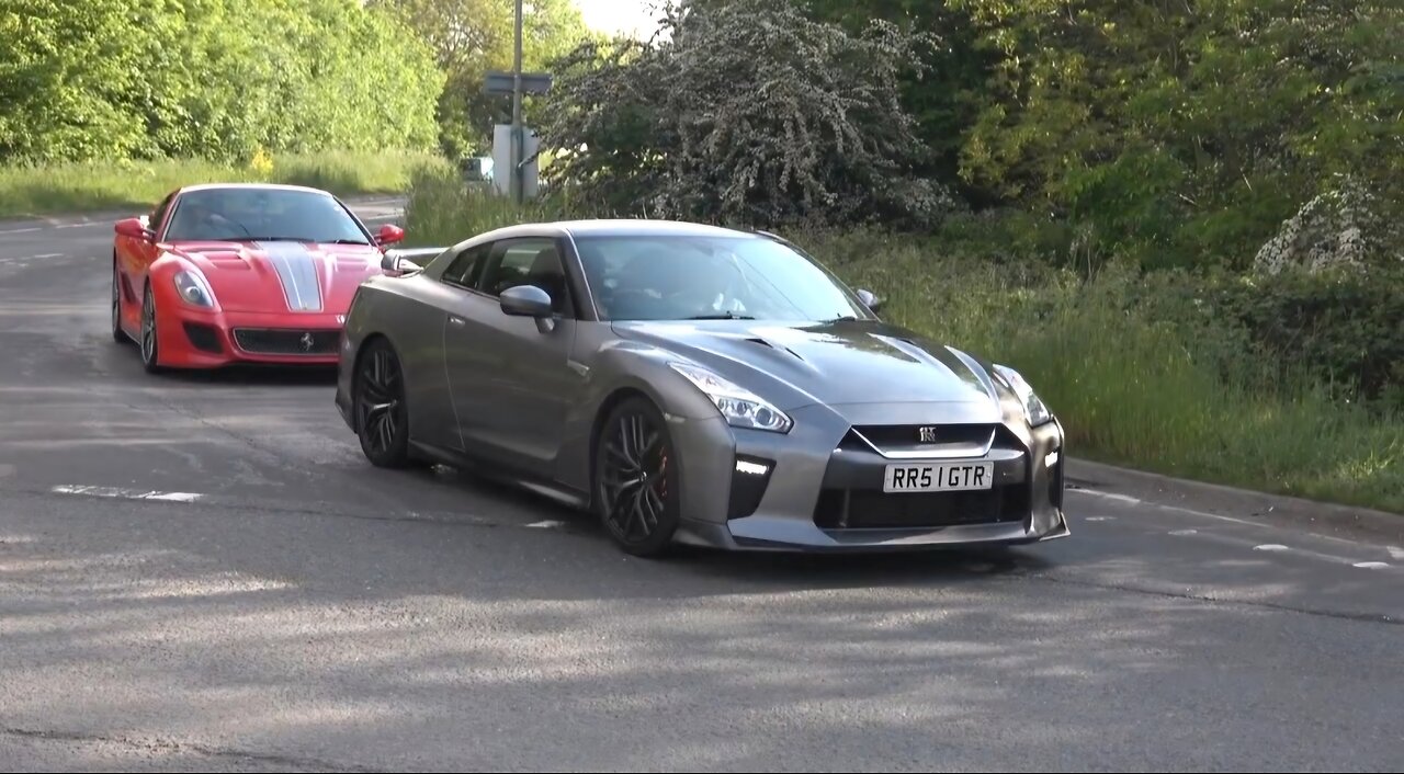 Modified supercars leaving car meet