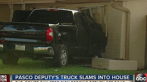 Pasco Deputy's truck slams into house