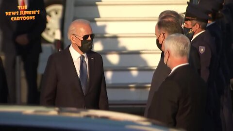 Biden keeps his mask on outside in Brussels.