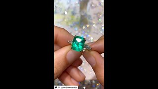 Hand made Colombian emerald cushion and tapered diamond three stone engagement ring personalized