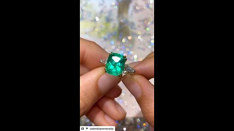 Hand made Colombian emerald cushion and tapered diamond three stone engagement ring personalized