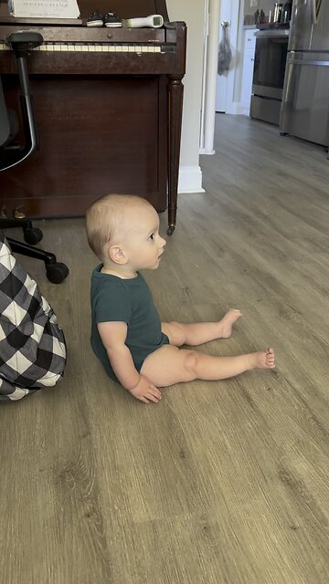 cute baby reacts to his favorite show