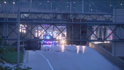 Two people killed after bus rolls over, catches fire in Milwaukee