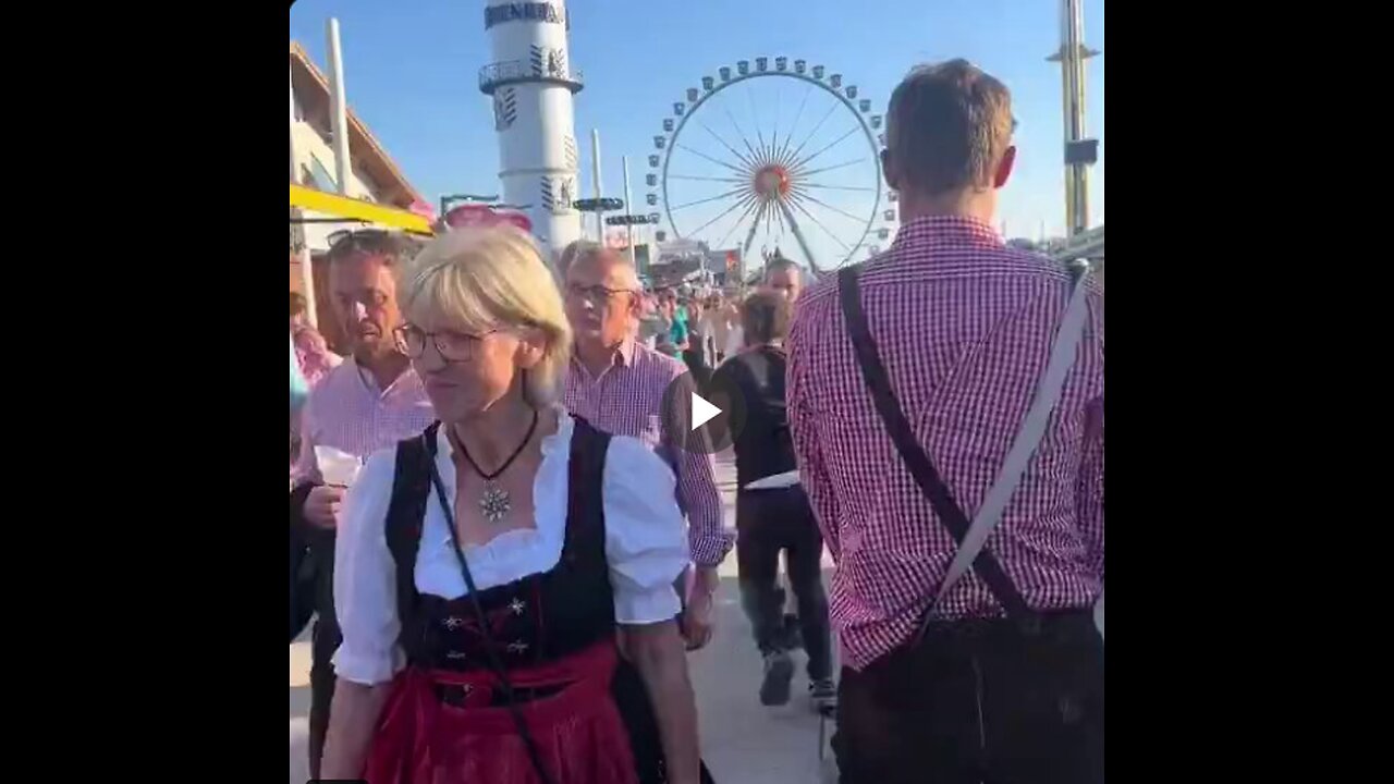 A migrant walks through Oktoberfest in Germany groping random women...