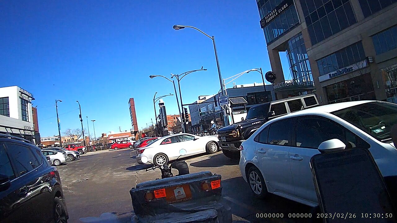 Guy hits parked car in parking lot