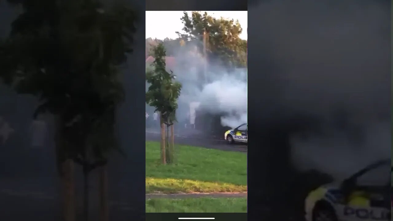 Police car set alight.