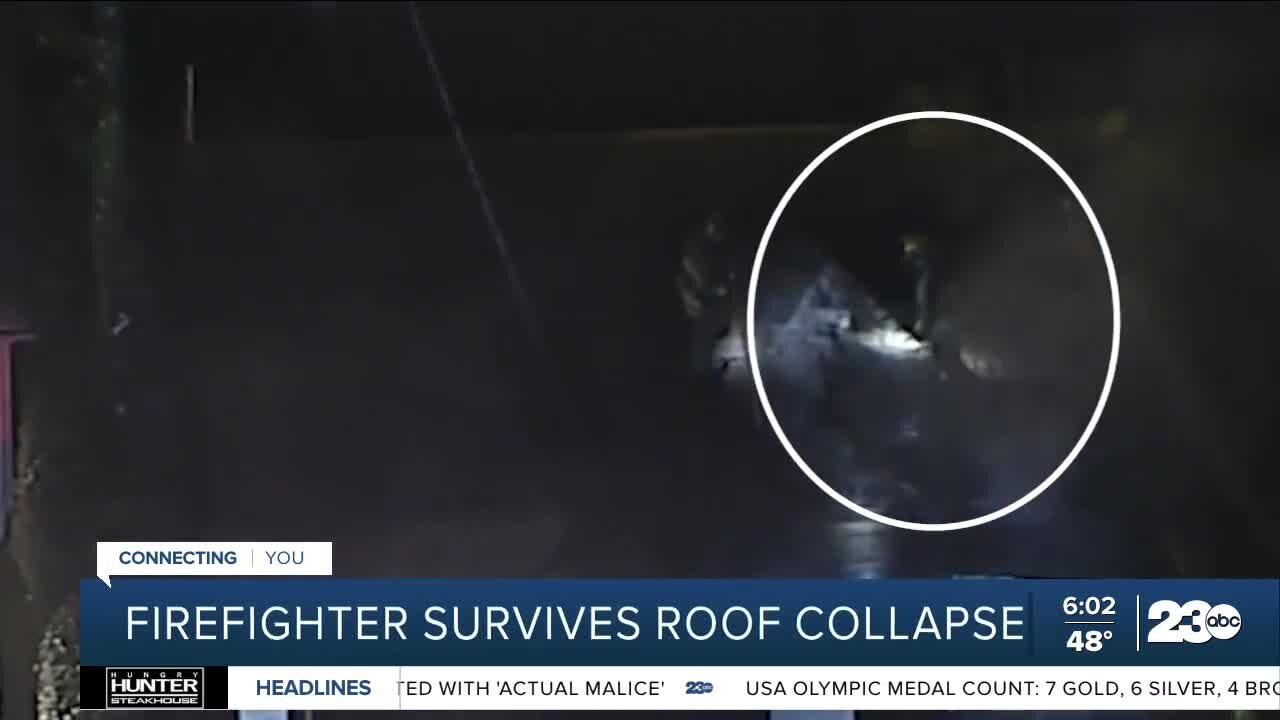 Firefighter falls through roof