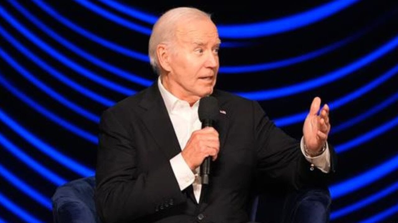 'So embarrassing': Barack Obama awkwardly leads Joe Biden off stage after freezing at fundraiser