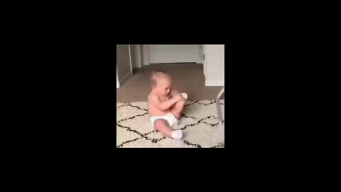 Baby try to wear socks