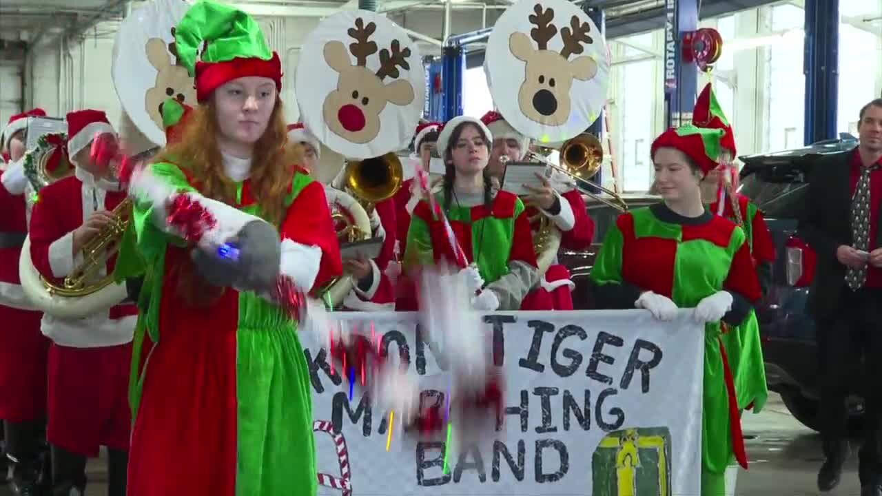 Akron High School marching band spreading holiday cheer in Buffalo