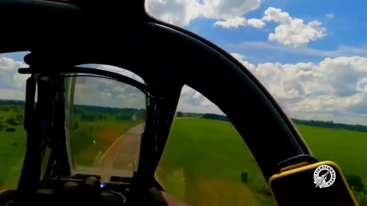 Su-25s are flying right over the highway.