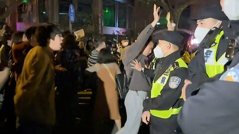 Chinese Protesters are smashing COVID barricades in Wuhan