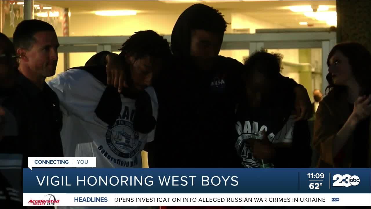 Vigil held by the community honors the West boys