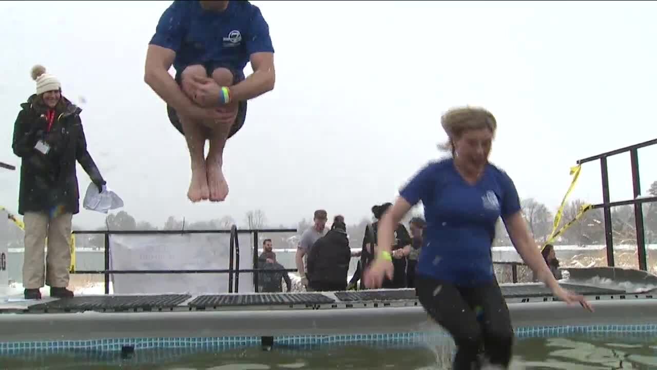 Dozens of people braved the cold to participate in the annual Polar Plunge for a good cause