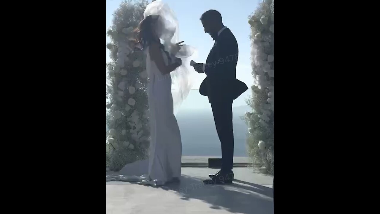 Bride's Veil flying away during Wedding Ceremony in Santorini