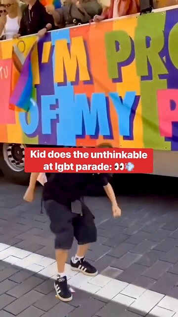 Kid Grabs LGBTQ Flag at Parade and Stomps on It