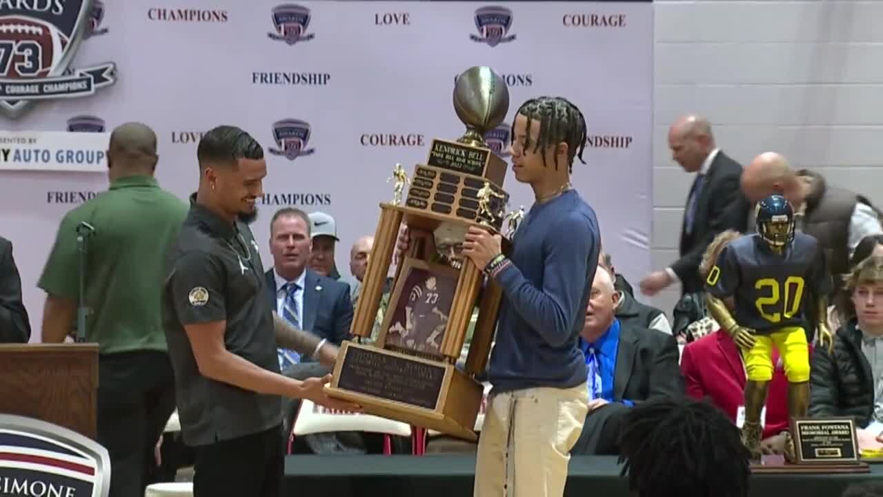 Kendrick Bell walksaround wih Thomas A. Simone Award